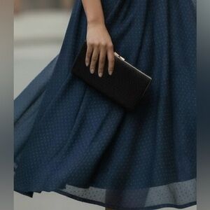 Elegant Black Clutch with Gold Toned Accents - Evening Wear